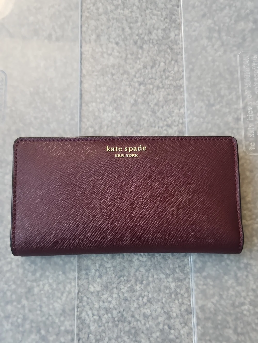 kate spade plum Saffiano leather continental wallet